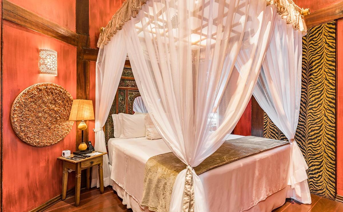 Dpny Beach Hotel & Spa Ильябела Экстерьер фото A mosquito net over a bed